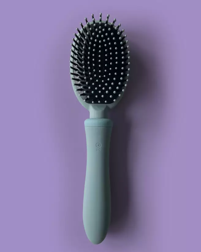 Brosse mauve VIBRALISS avec vibrations intenses pour soin capillaire