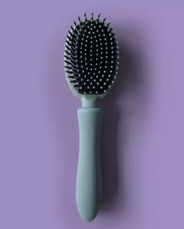Brosse mauve VIBRALISS avec vibrations intenses pour soin capillaire