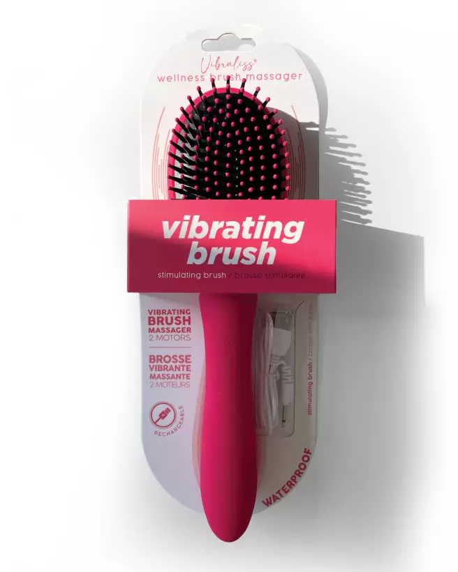 Brosse vibrante rose VIBRALISS en silicone douce, usage capillaire et intime