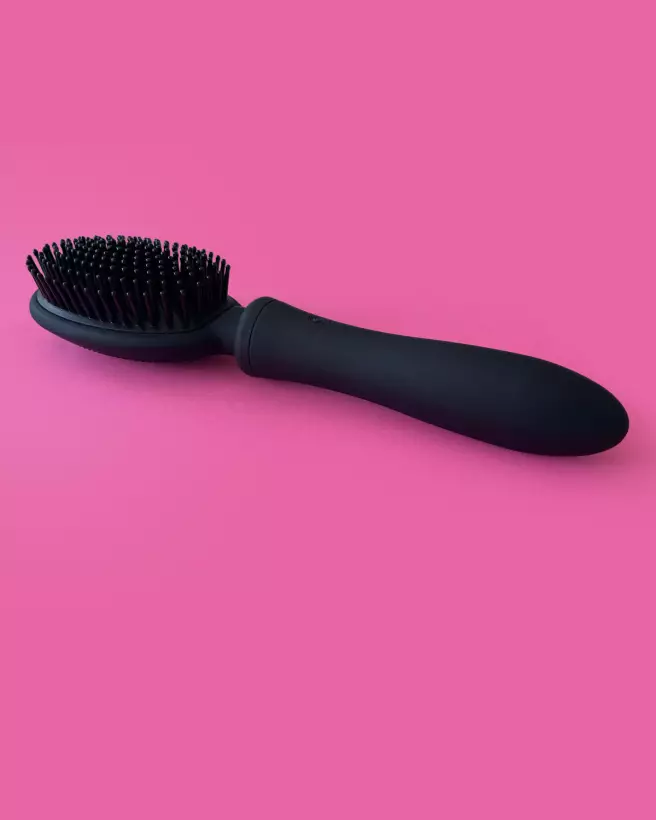 Brosse rechargeable noire VIBRALISS pour massage cuir chevelu intense