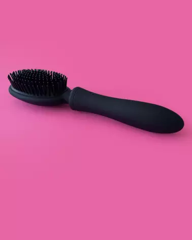 Brosse rechargeable noire VIBRALISS pour massage cuir chevelu intense