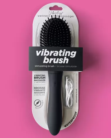 Brosse VIBRALISS noire étanche et rechargeable pour massage capillaire