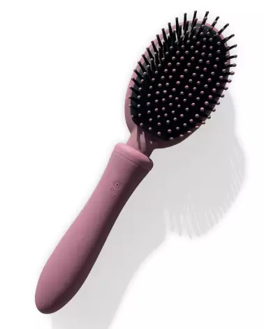 Brosse VIBRALISS mauve étanche et rechargeable pour massage capillaire